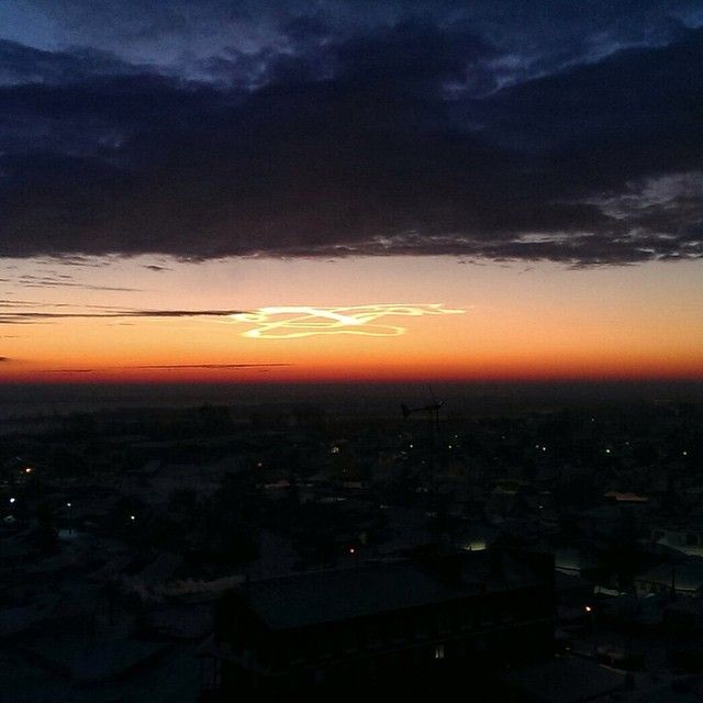 Облако необычной формы над вечерним Барнаулом