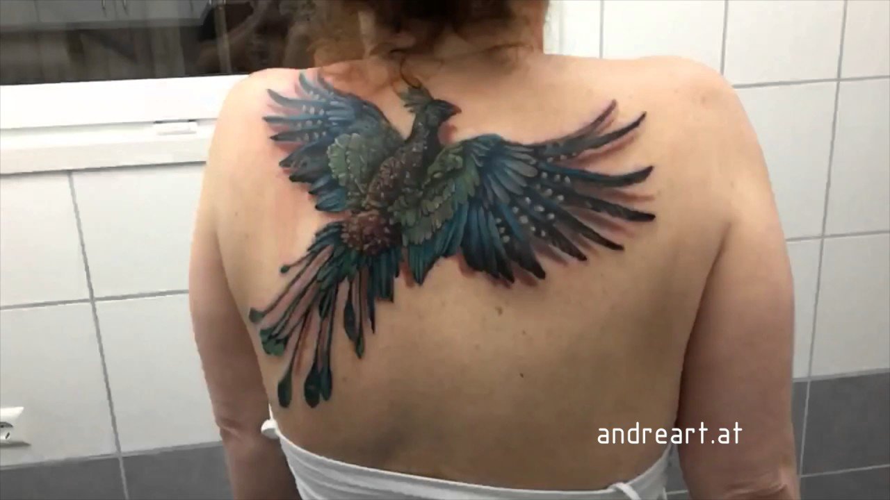 Потрясающая татуировка летящего феникса