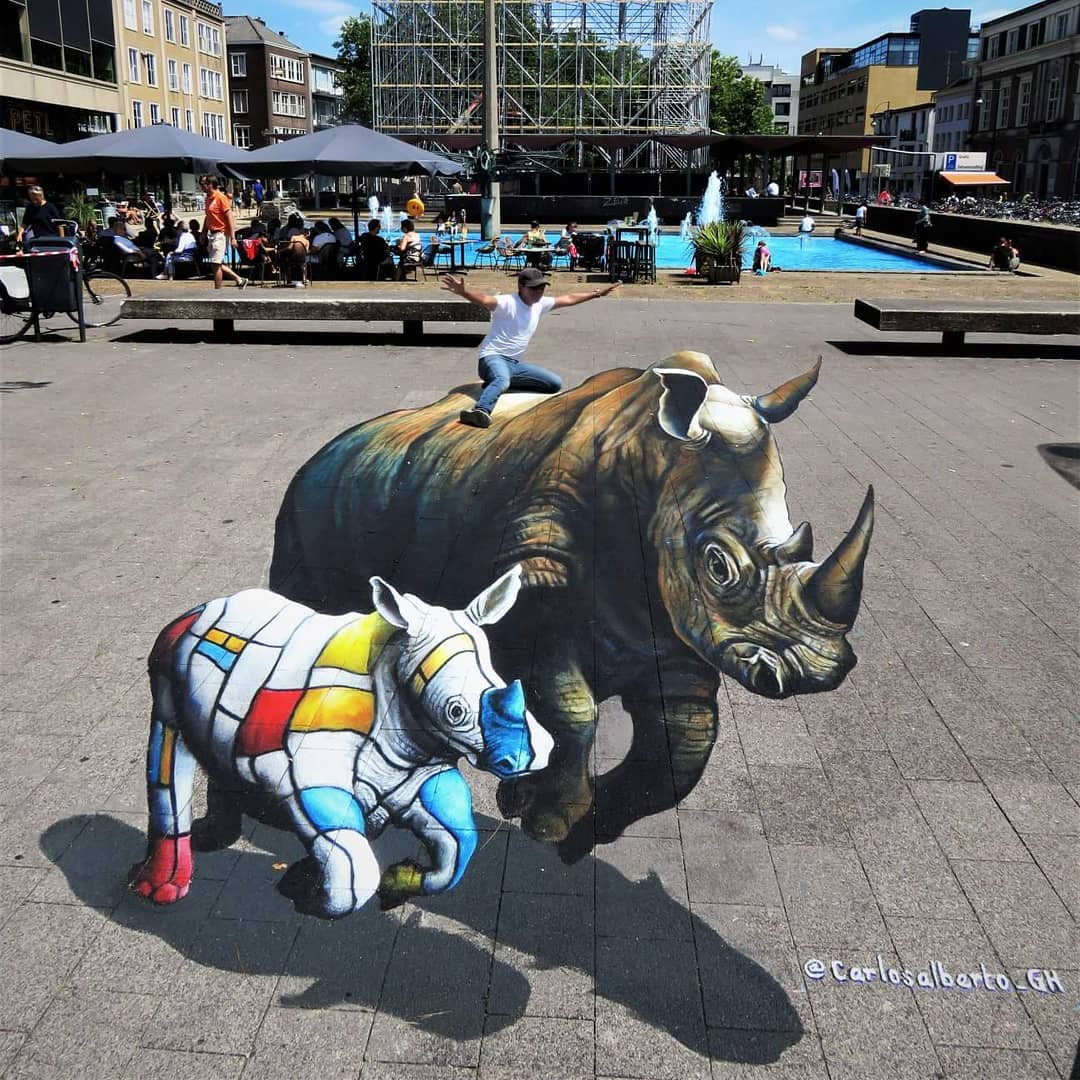 Уличный художник искажает реальность трёхмерными иллюзиями (17 фото)